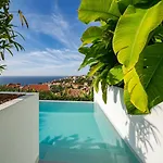 Casas Da Vargem Shared Swimming Pool By An Island Casa de Férias *